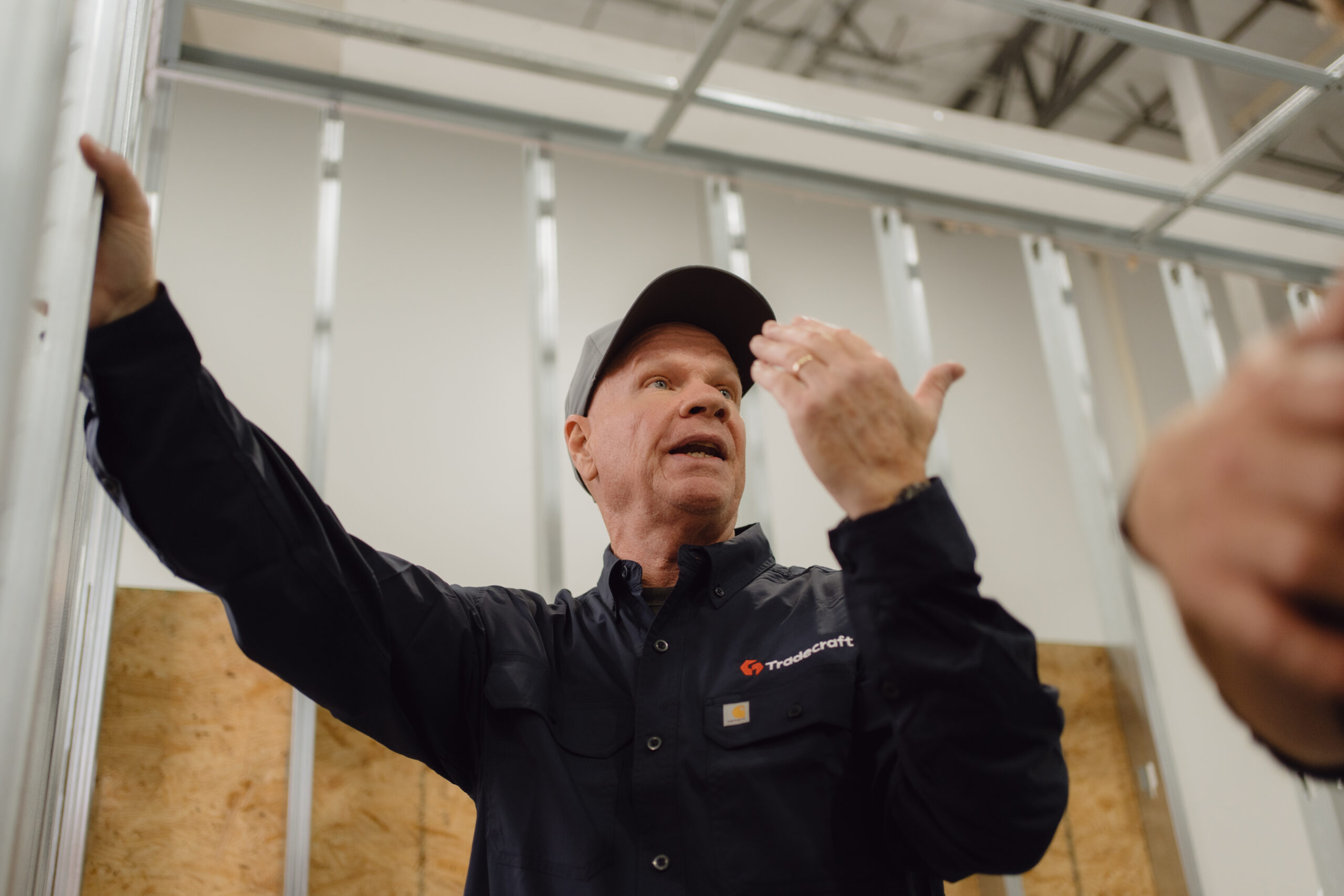 Instructor demonstrating tool use to students
